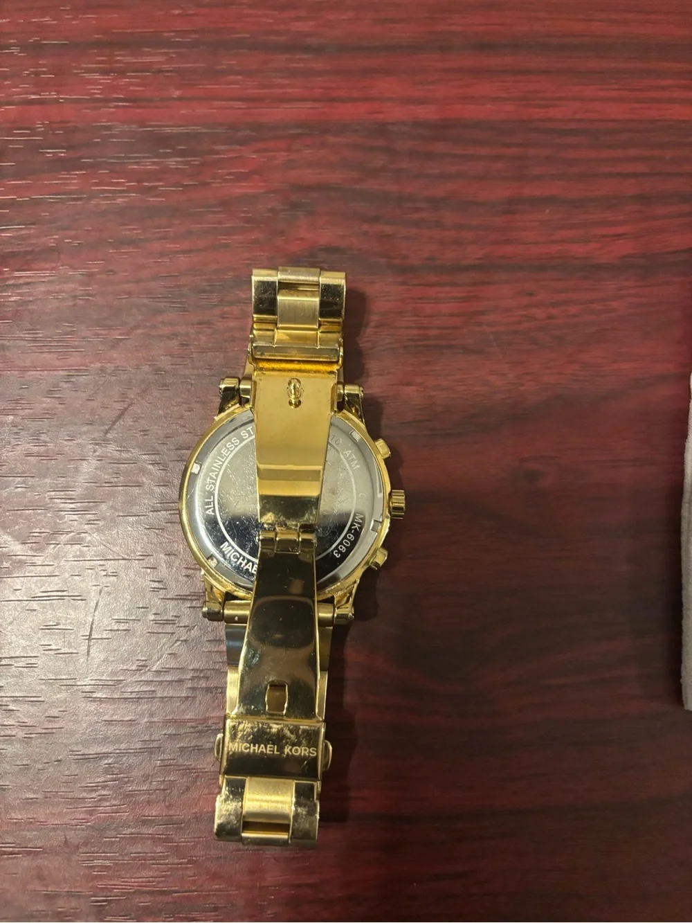 Michael Kors Gold and Black Chronograph Watch. MK6063